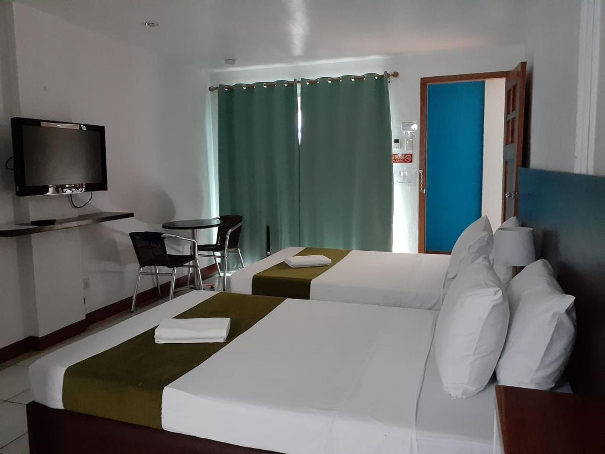 Mr Holidays Hotel Balabag  Bagian luar foto